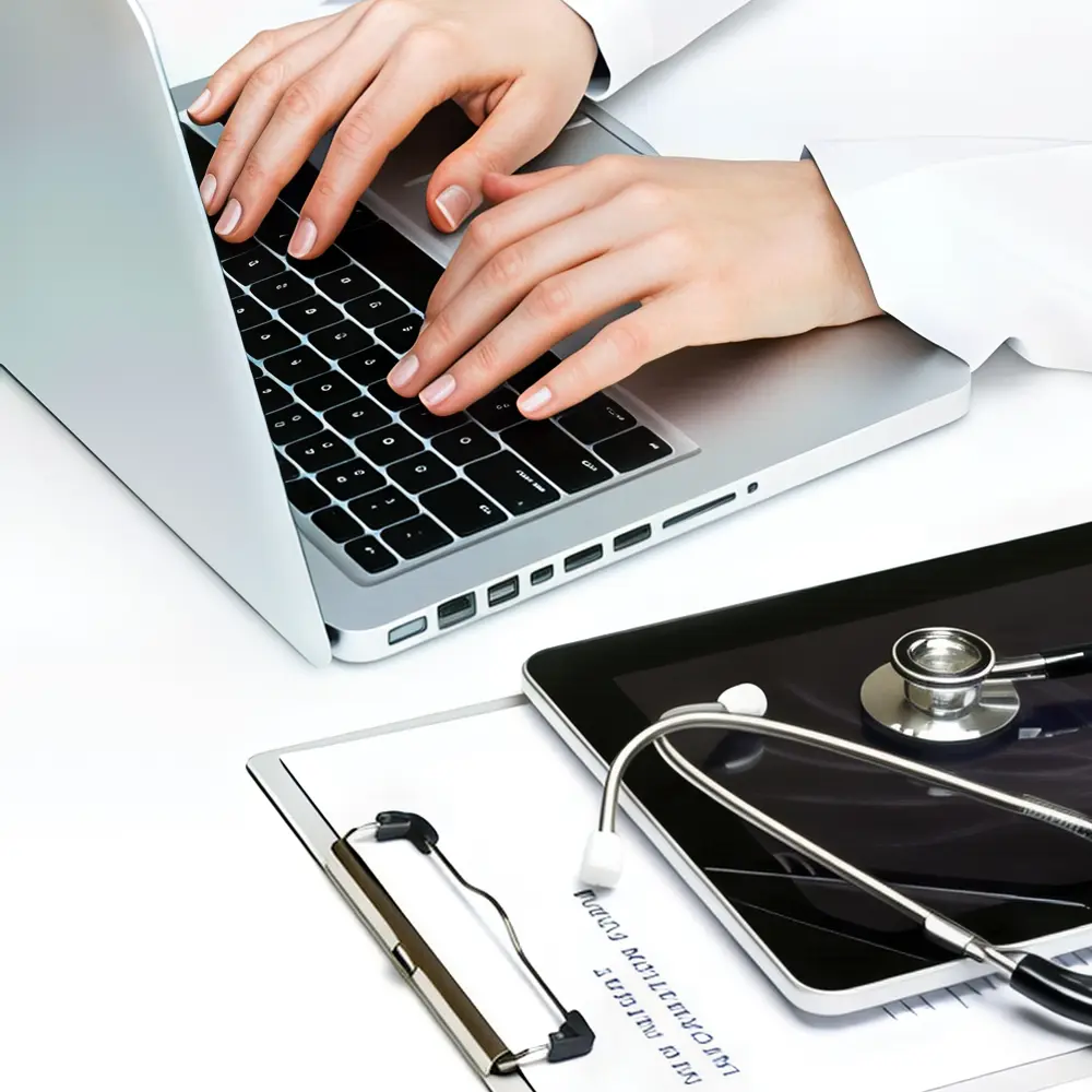 doctor typing notes into laptop for perimenopause issues